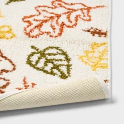 17"x24" Fall Leaves Non-Slip Harvest Bath Rug Cream - Room Essentials™ -RoomEssentials Sales Store GUEST 09b12298 3553 476d 8c0e 28449ea238c8
